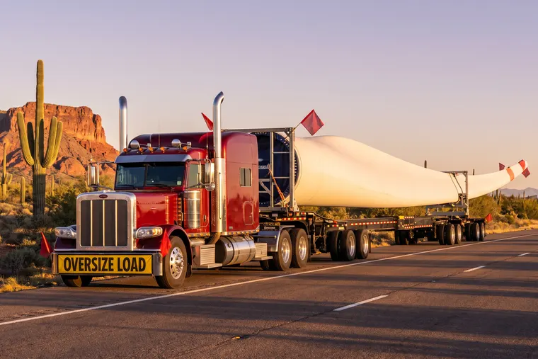 Wind turbine blade on an oversize trailer